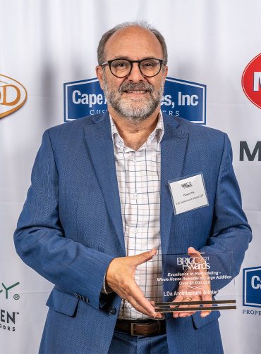 LDa Principal, Douglas Dick, accepting our 2021 BRICC award.