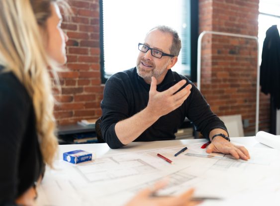 Peter Makrauer working with colleague