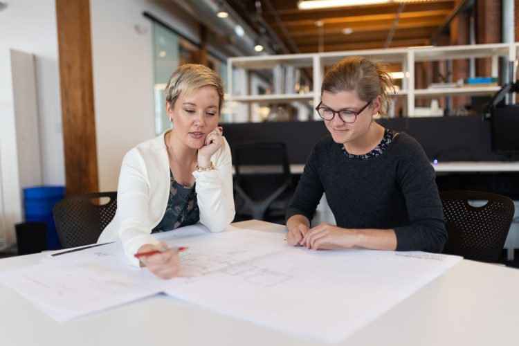 Gillian working with colleague