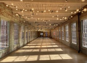 Rustic brick building with hanging lights