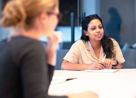 Sabrina Afrin in a meeting