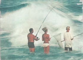 Vintage photo of people fishing in the ocean